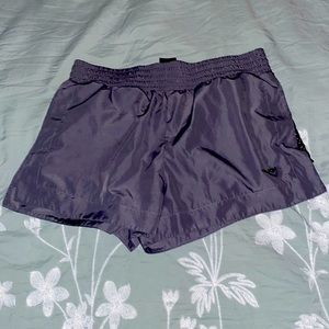 Grey athletic shorts (women’s). Size-medium. Cute fishnet on sides for design.